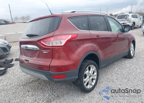 2016 Ford Escape Titanium z USA, uszkodzony, nr VIN 1FMCU9JX2GUB55472
